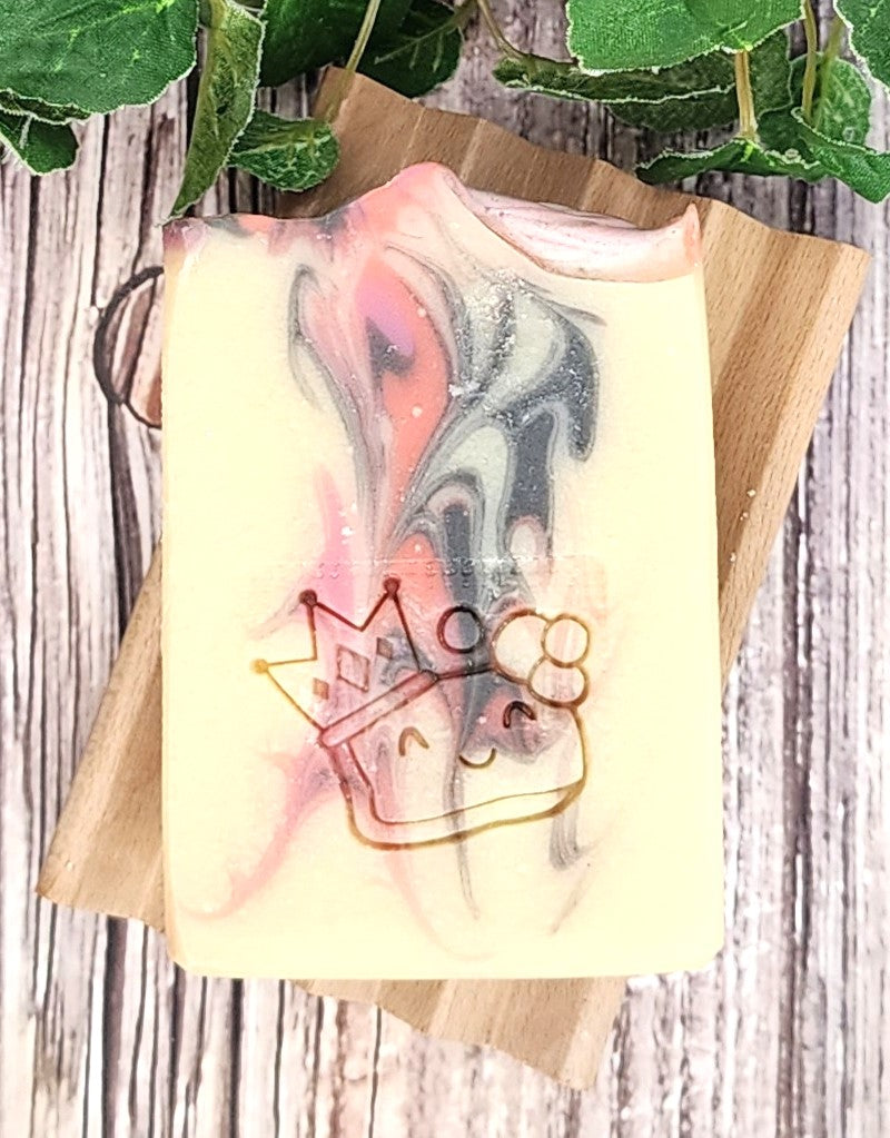 Black Raspberry Soap with abstract design on a wooden surface