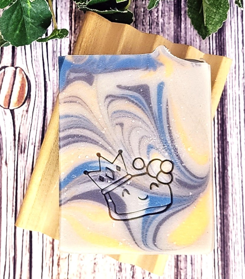 Fizzy Blackberry Marbled soap on a wooden soap dish