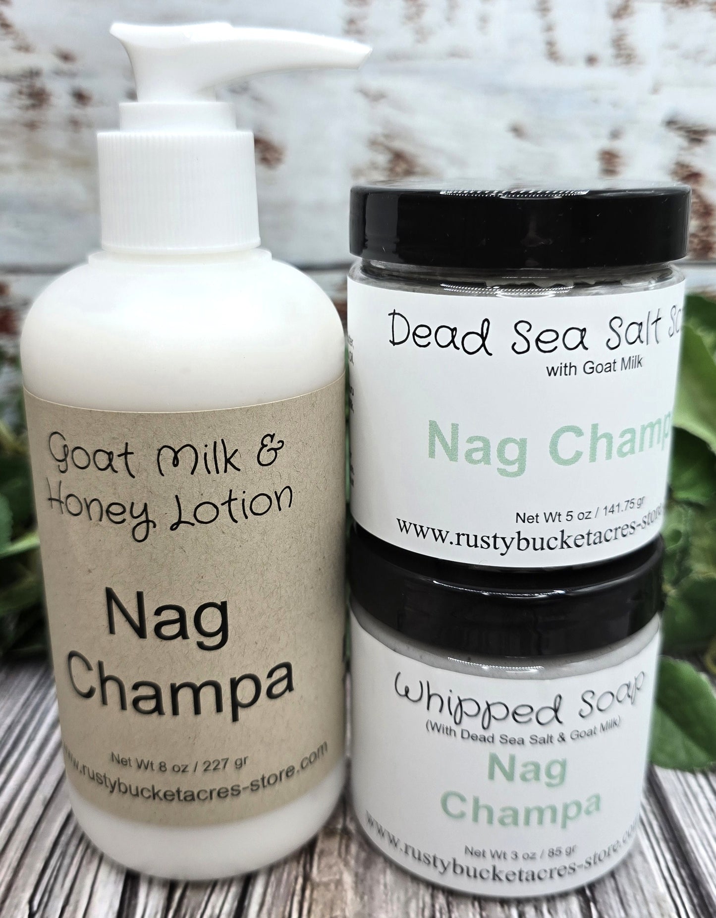 Shows an 8oz bottle of lotion with a 4 oz jar of whipped soap & dead sea salt scrub