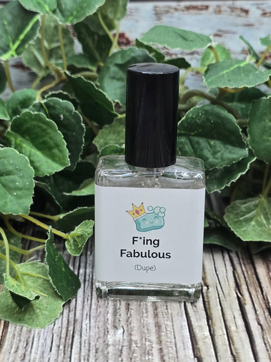 Small bottle with a label on a wooden surface with green leaves in the background
