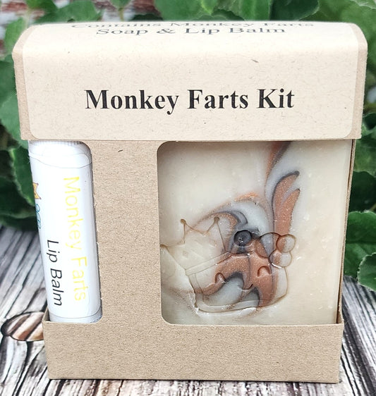 Shows a bar of soap and lip balm in a brown box labeled monkey farts kit