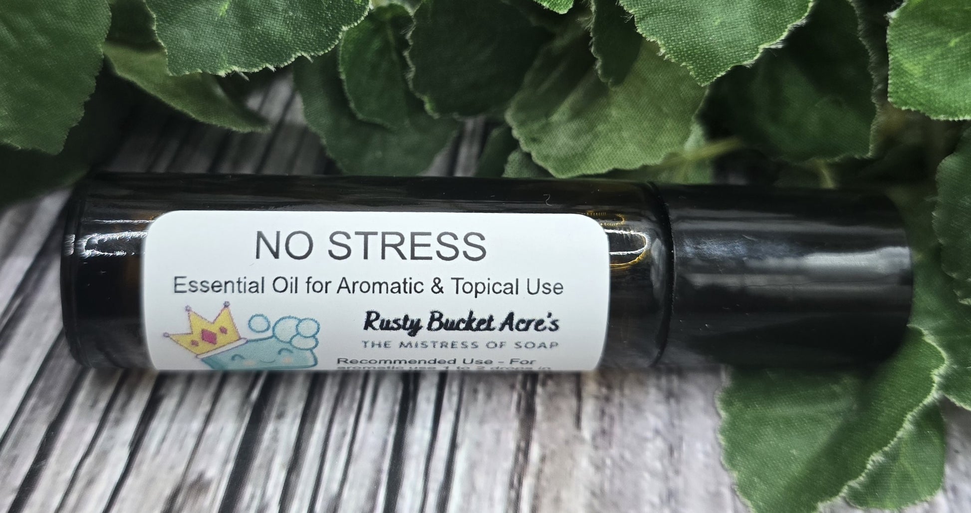Roll-on bottle labeled 'No Stress' with a green leafy background
