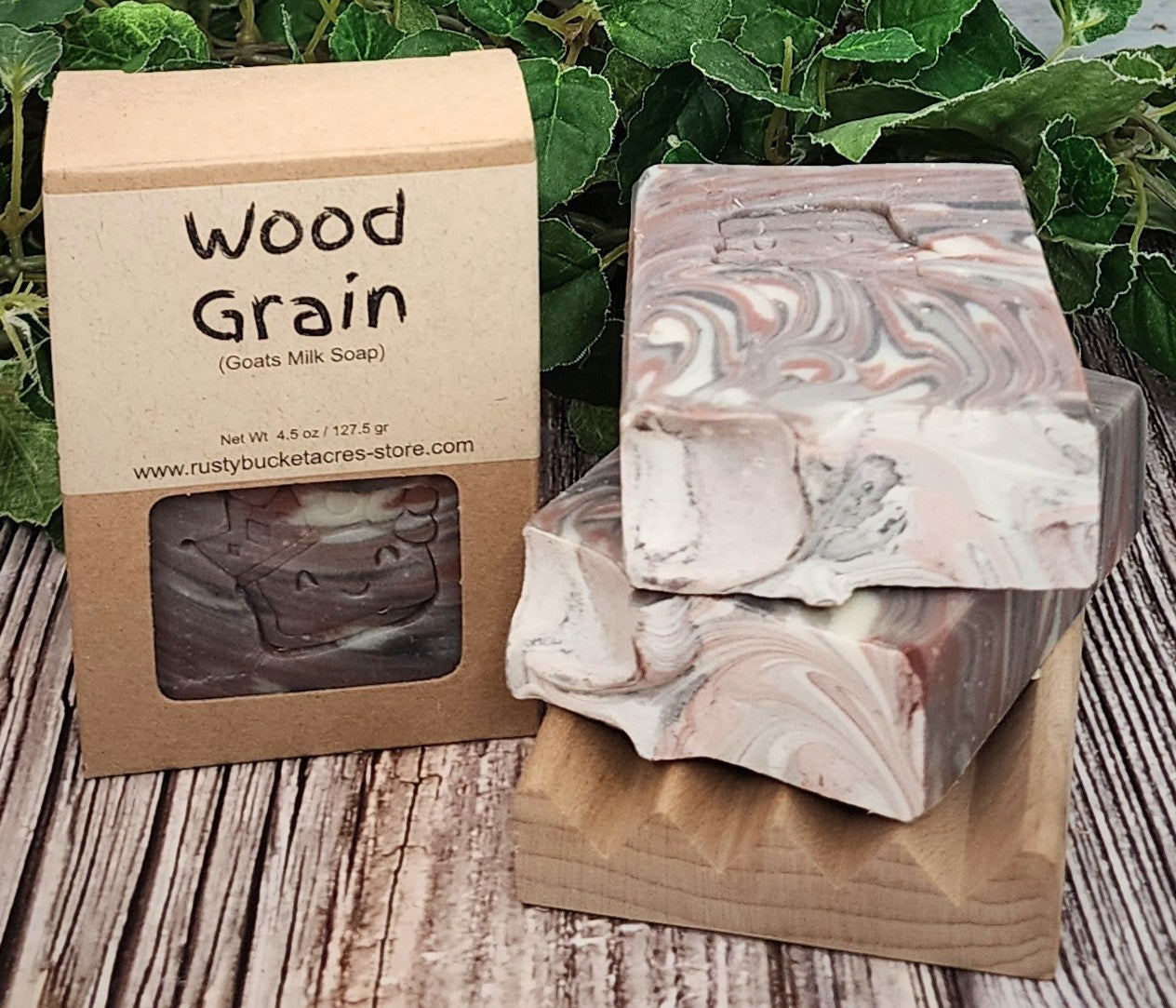 Wood Grain soap with packaging on a wooden surface